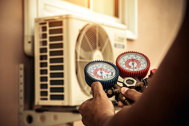 Professional Heat Pump Repair technician working in Maynard, MA